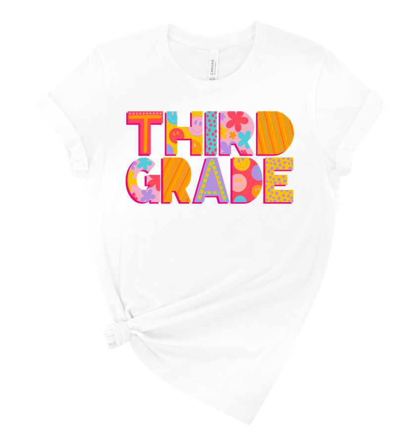 spotty smiley grade level tee | white